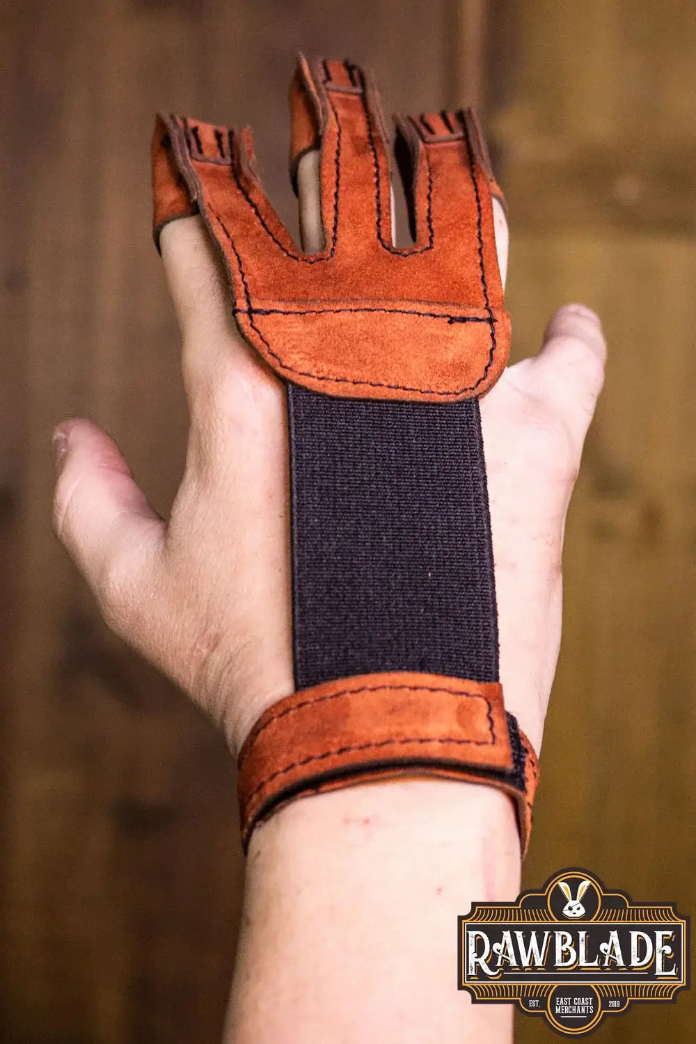 Close-up of Archery Glove Kane showing three fingers, adjustable wrist strap, and high-quality leather material.