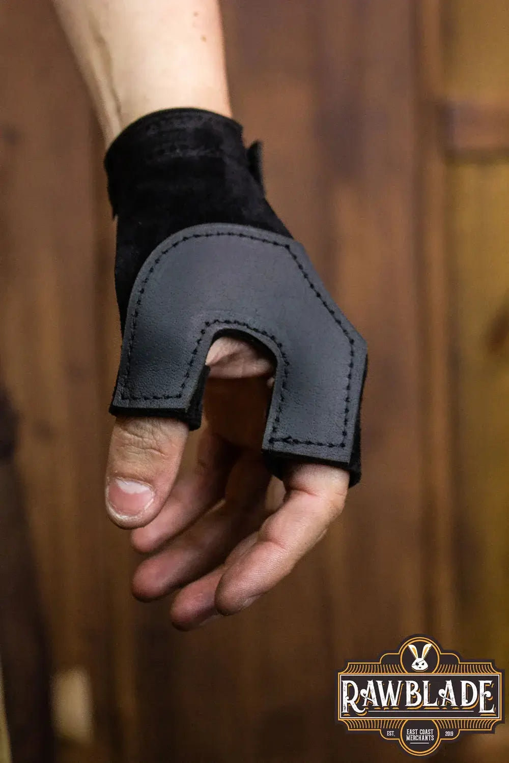 Archery Glove Oren in black and grey, designed for bow hand protection with adjustable wrist.