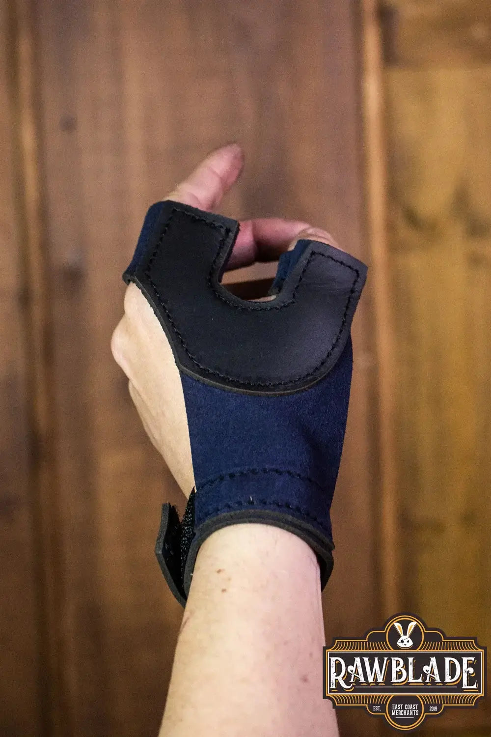 Archery Glove Oren shown on a hand, featuring high-quality split leather and adjustable velcro wrist.