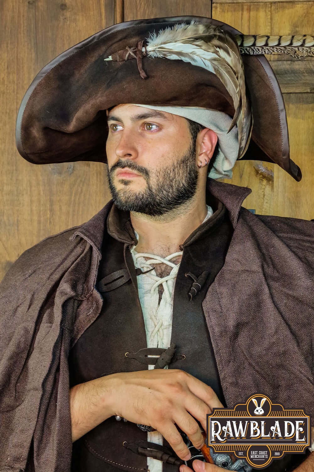Man wearing Captain Teague Hat with Feathers from Rawblade, showcasing a pirate-inspired look.