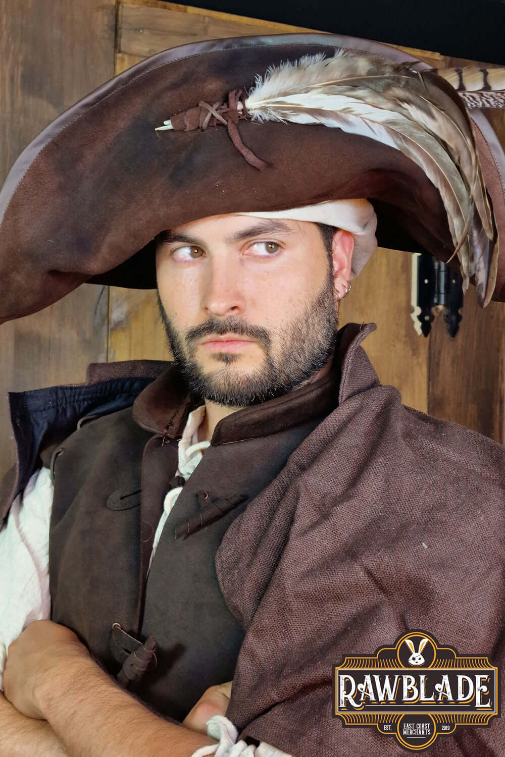 Man wearing Captain Teague Hat with Feathers, showcasing its weathered style and authentic pirate look.
