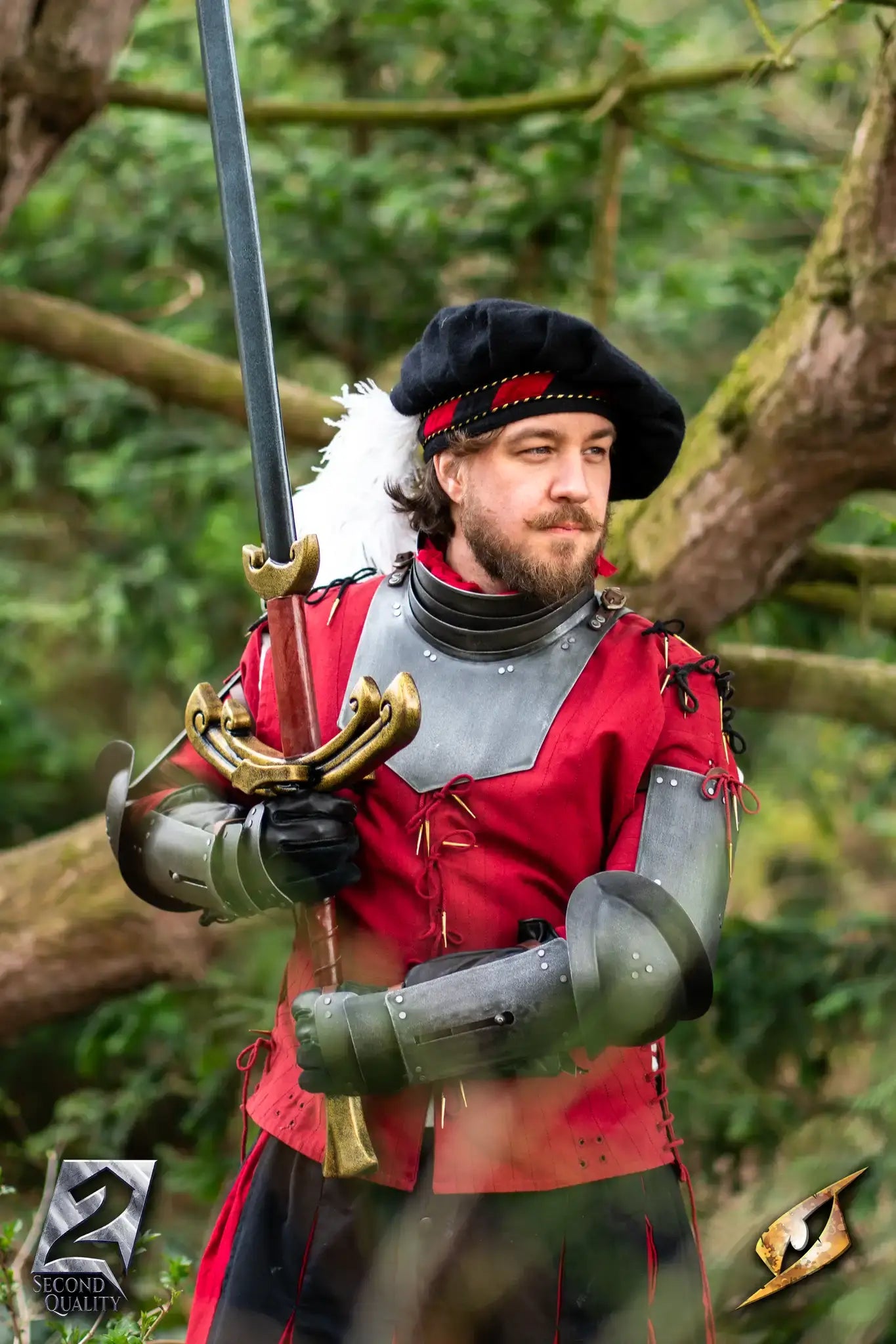2nd Quality – Landsknecht Greatsword displayed by a soldier in Renaissance armor, holding a sword in a forest.