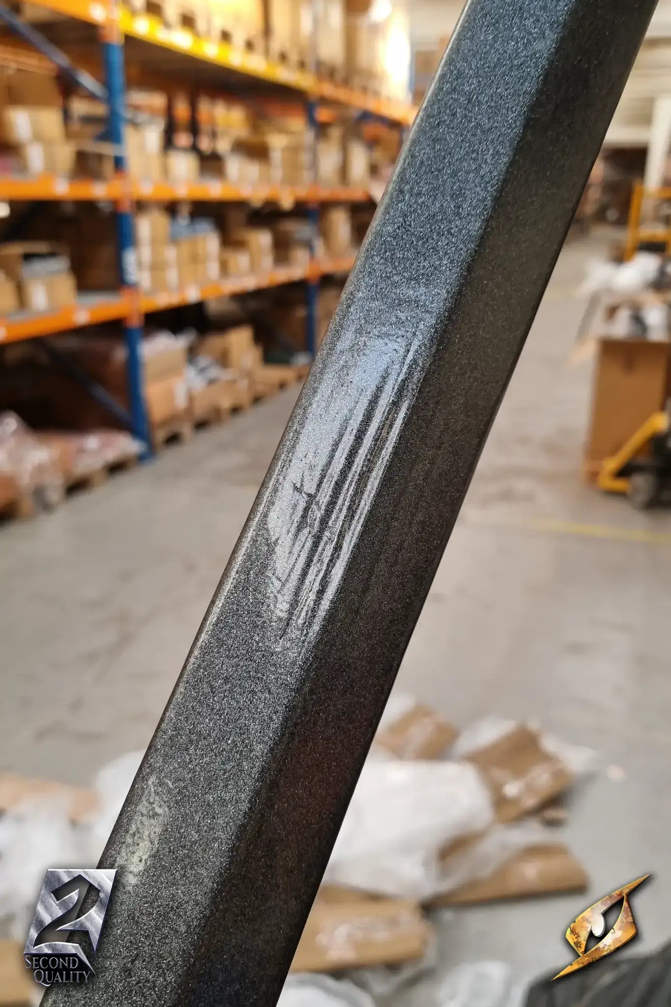Close-up of the blade of a 2nd Quality – Landsknecht Greatsword showcasing its detailed finish and surface.