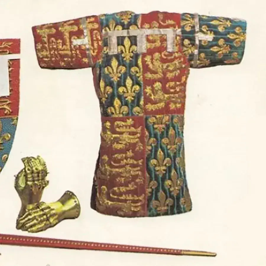 Intricately embroidered medieval tunic with rich colors, ornate designs, and accompanying knight's armor pieces.