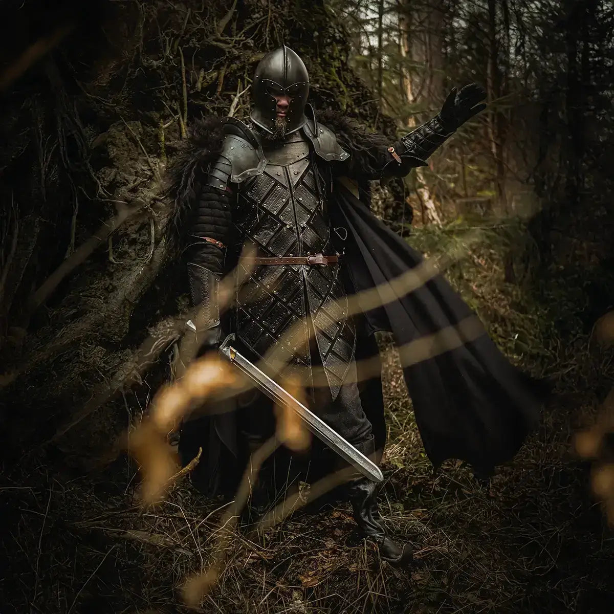 A knight in dark armor posing with a sword, surrounded by a forest backdrop, evoking a medieval fantasy theme.