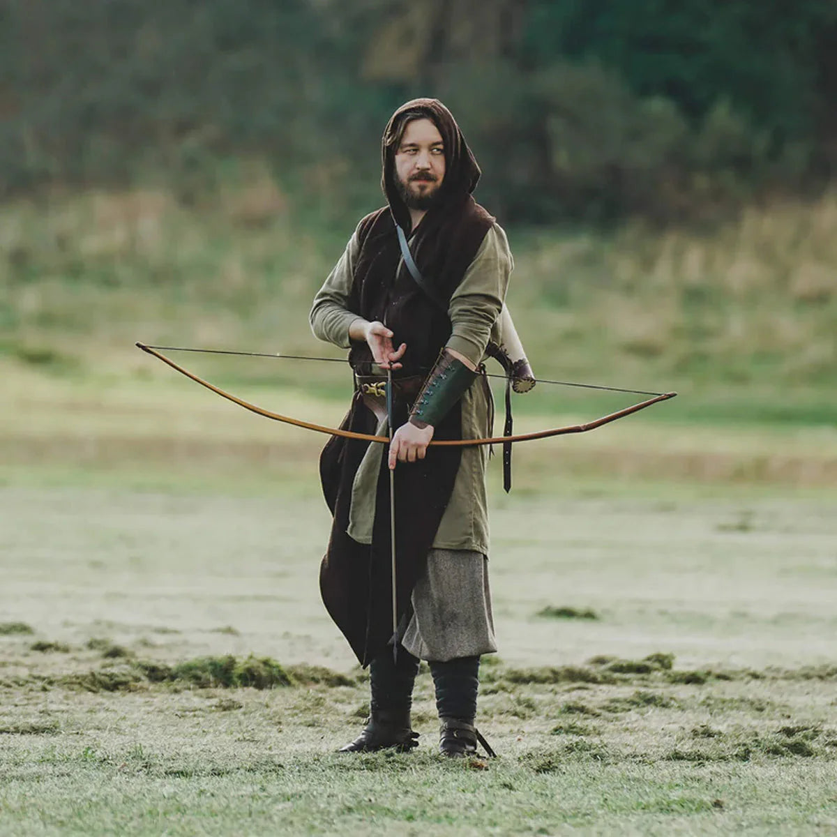 5 LARP costumes you can build with Epic Armoury gear featuring an archer in a medieval setting.