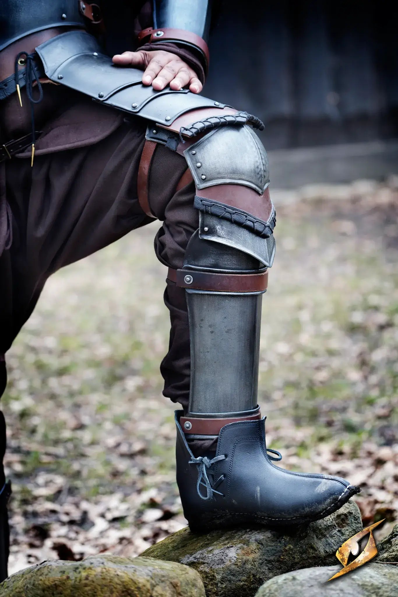 Leg Armour featuring detailed greaves and leather straps elevating your LARP experience on the battlefield.