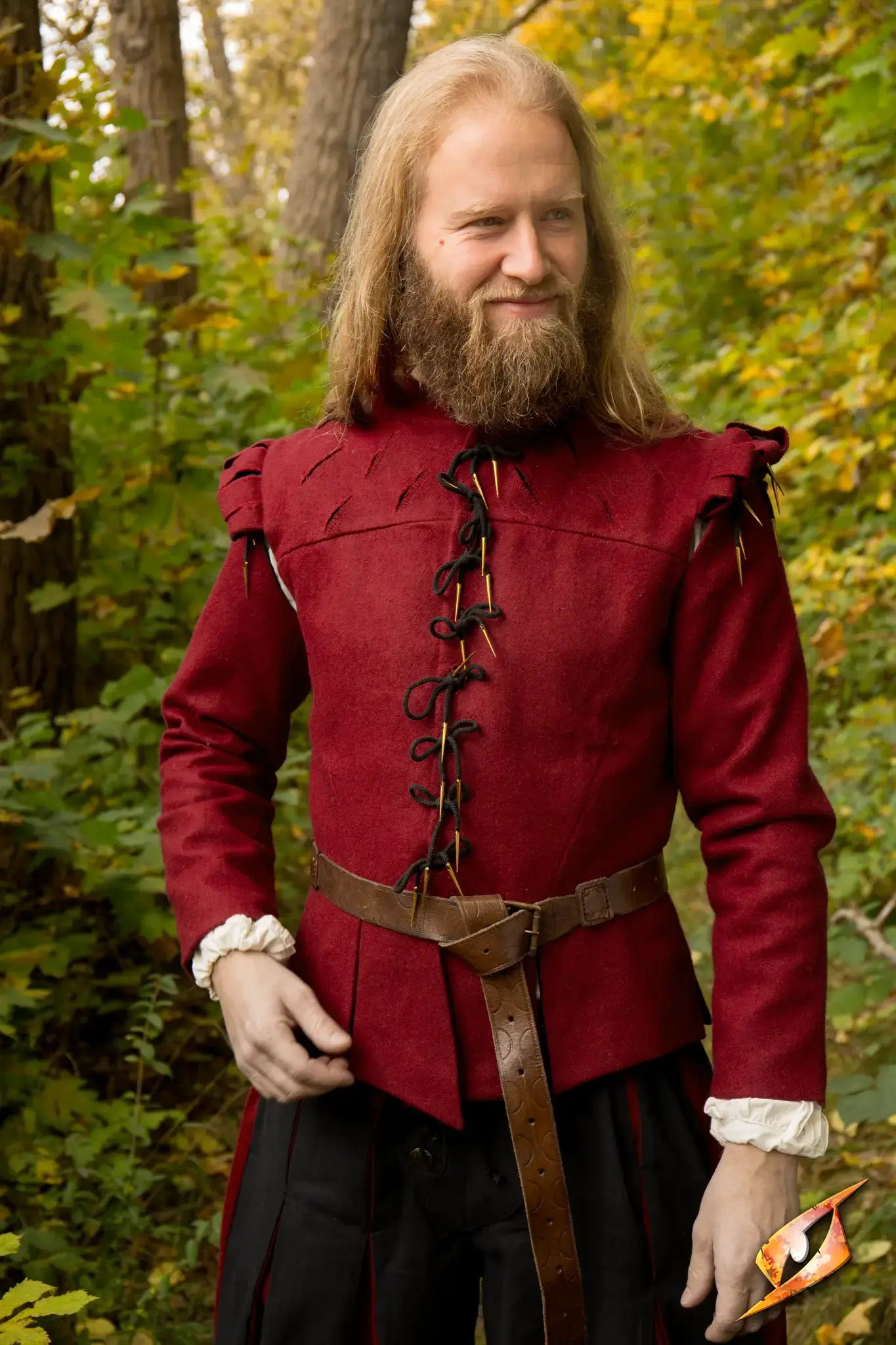Red doublet from the Doublets & Coats collection, blending medieval and fantasy styles in a natural setting.