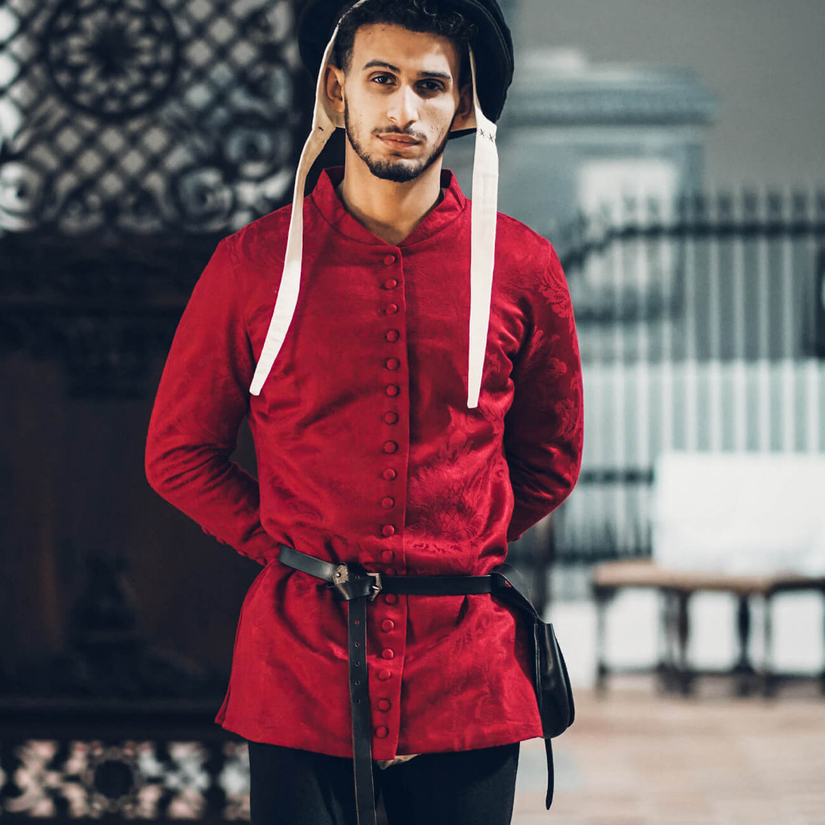 Cotehardies red fitted garment for men, showcasing 14th century medieval fashion style.