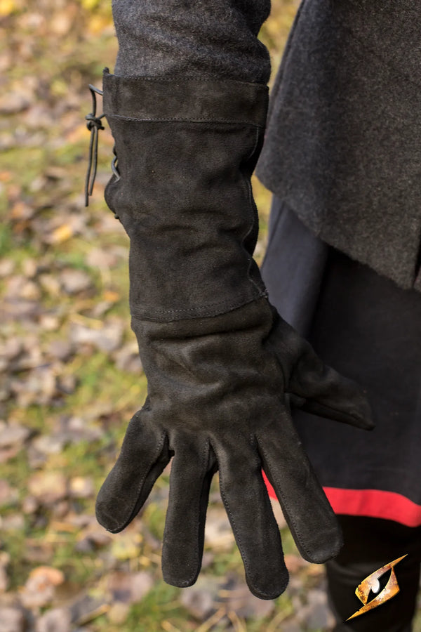 Stylish black Leather Gloves designed for warmth and comfort, perfect for outdoor activities and fashion.