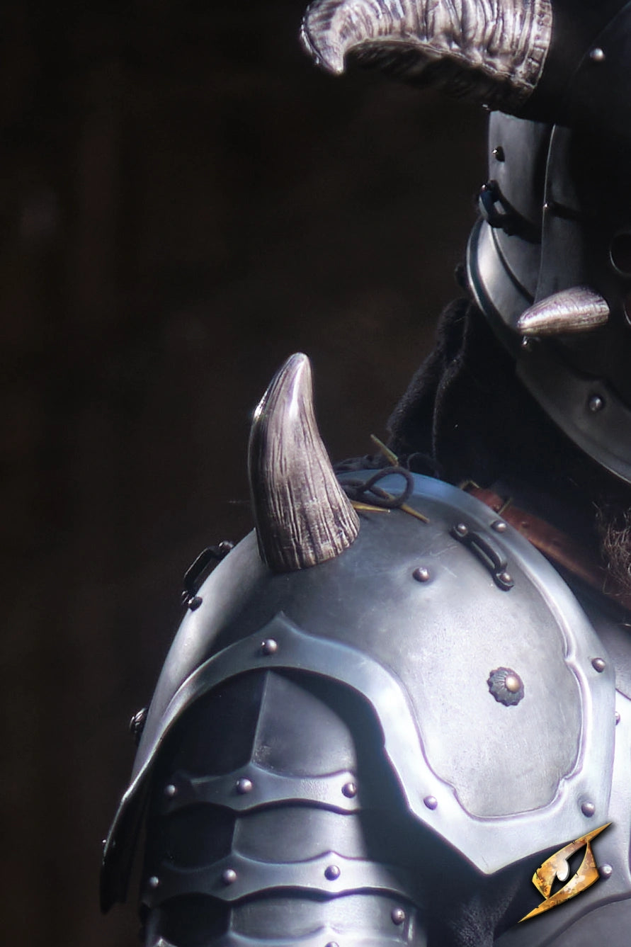 Mountable Demon Horns attached to shiny medieval armor, enhancing the fierce warrior look.