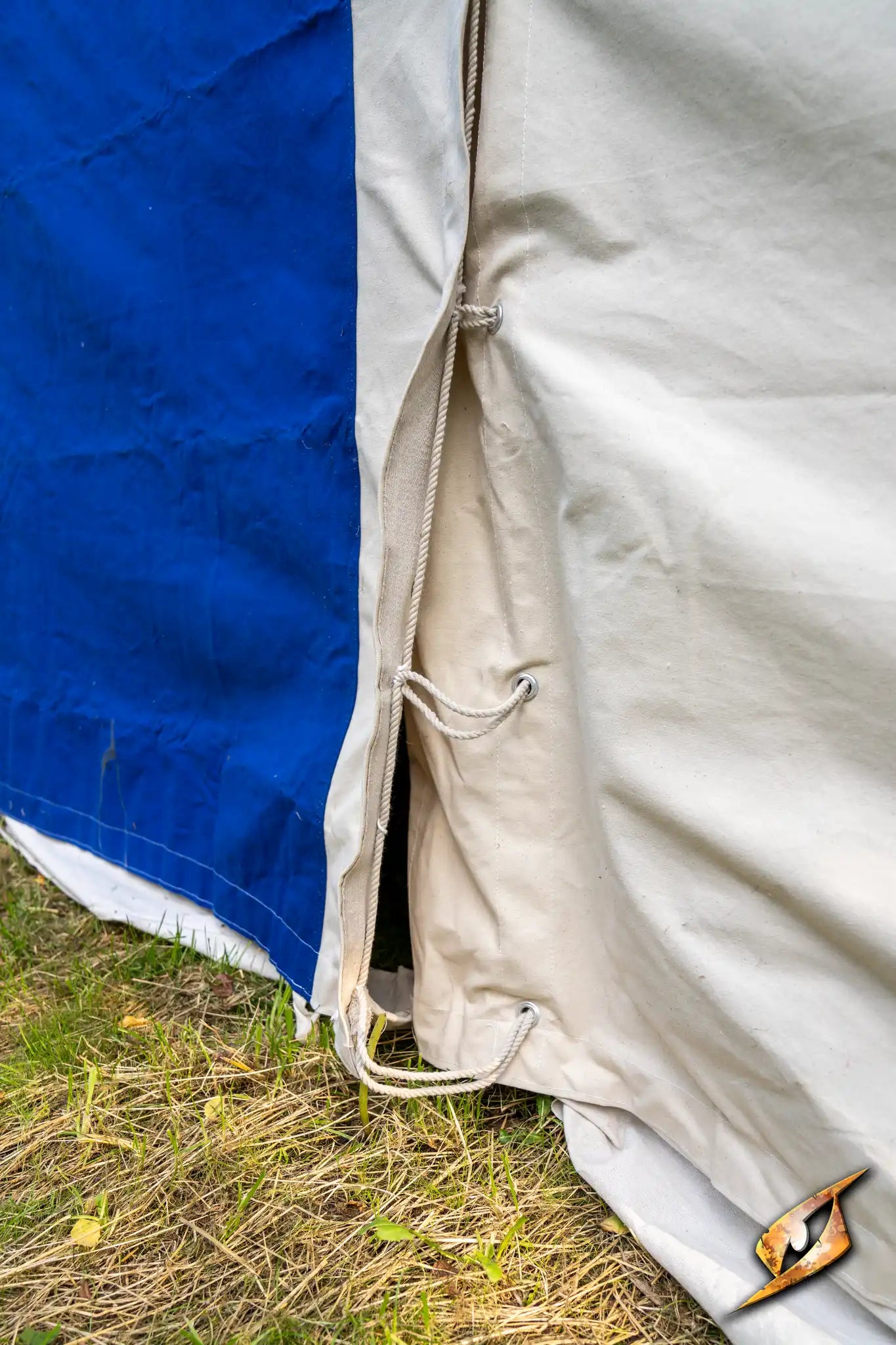 Close-up of the entrance of a Marquee Tent - 4x6m showing fabric and ties.
