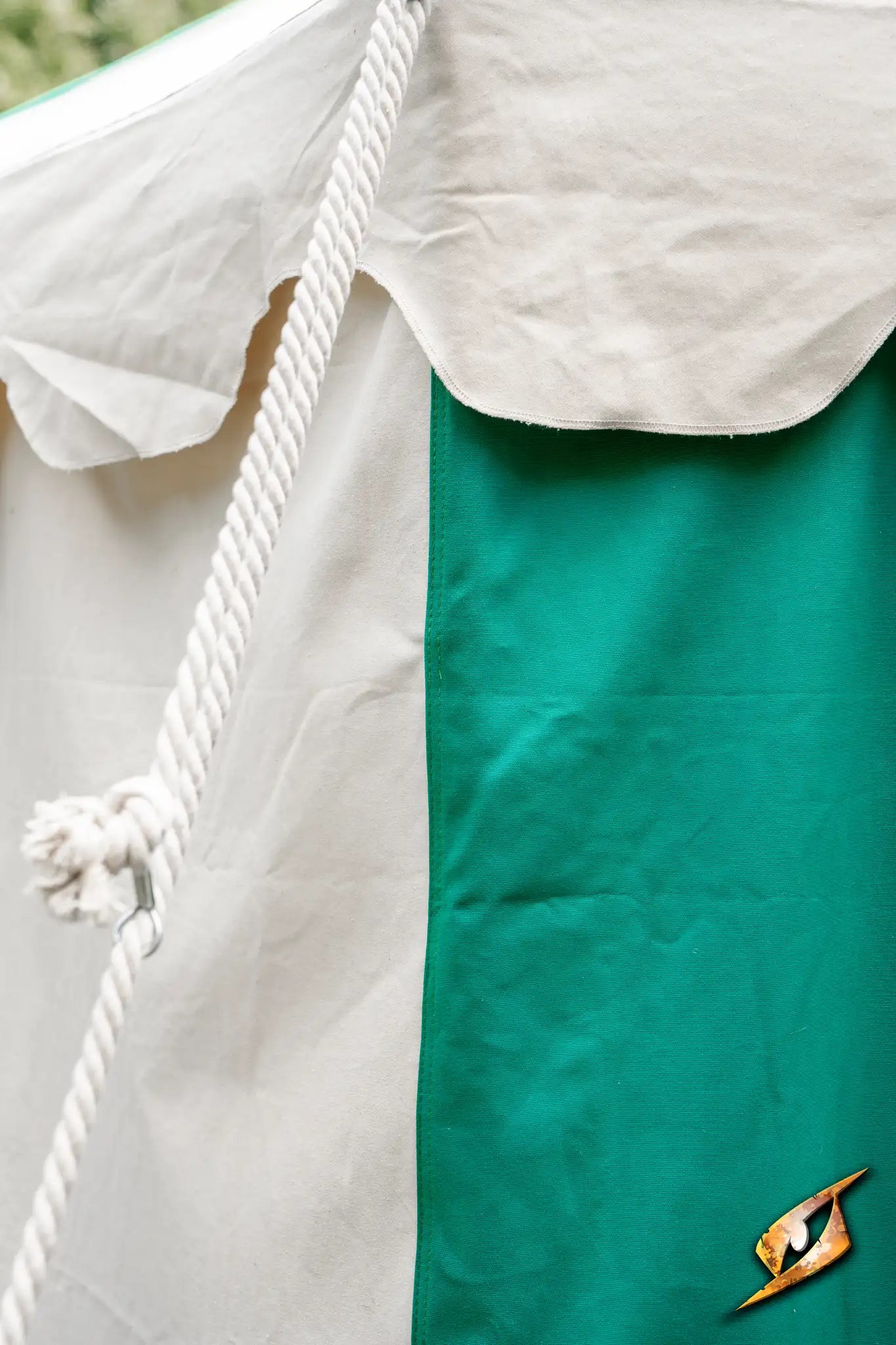 Detailed view of the Marquee Tent - 4x6m showing green fabric and rope details.