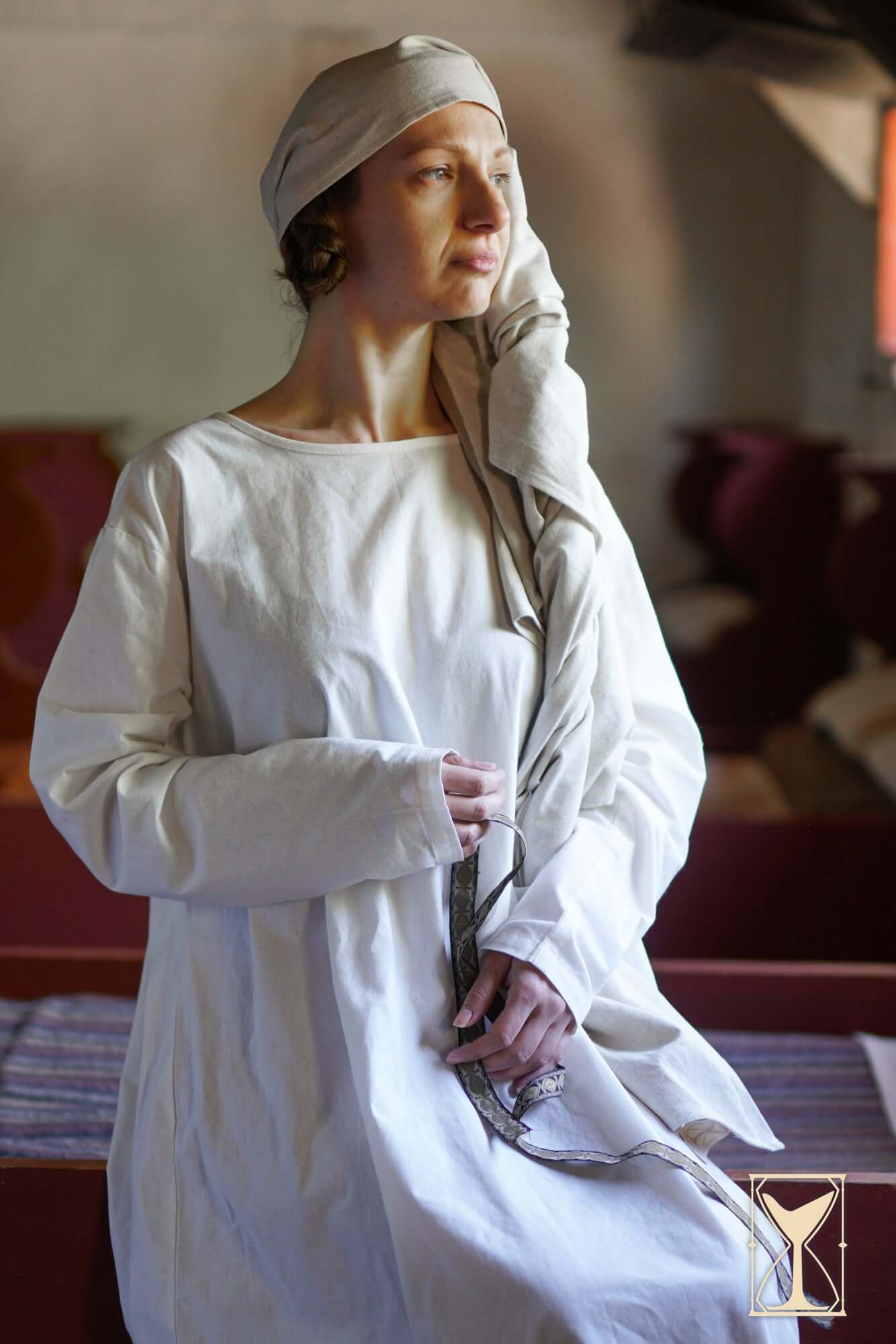 Rectangular Veil and Fillet - Cotton/Linen Blend worn elegantly in a historical setting.