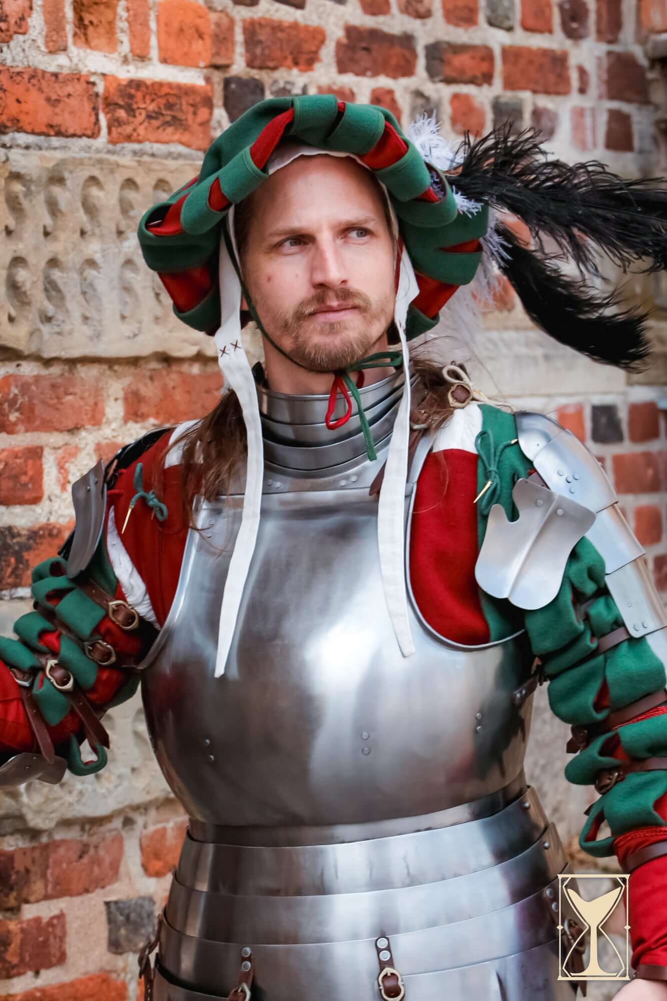 Landsknecht Gorget - 1.6mm - Yoremade worn by a historical reenactor, showcasing armor details and vibrant attire.
