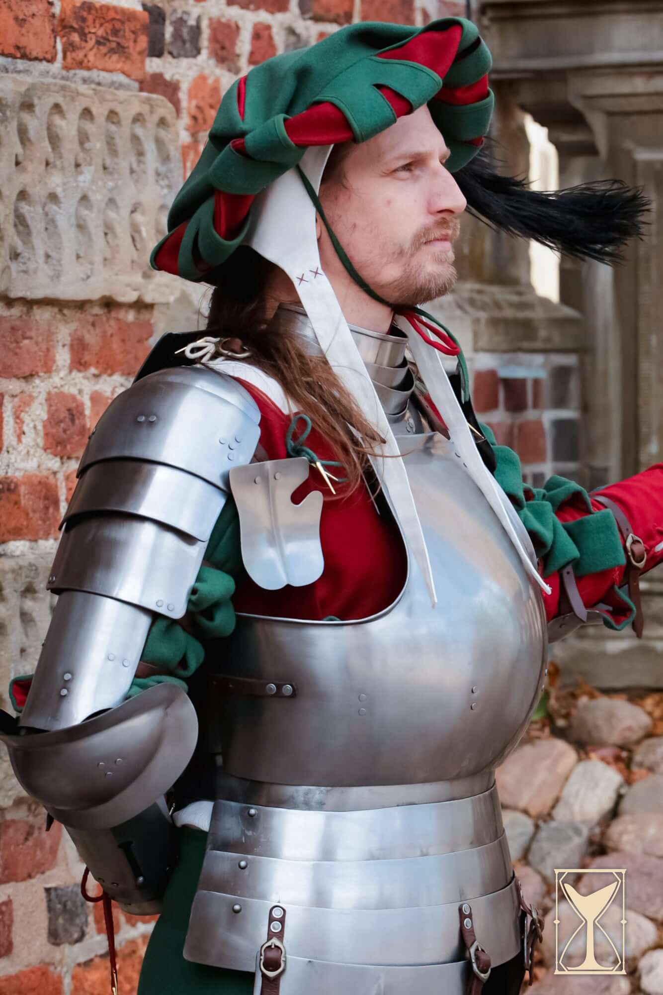 Landsknecht Spaulder - 1.6mm - Yoremade worn by a man in medieval armor and clothing.
