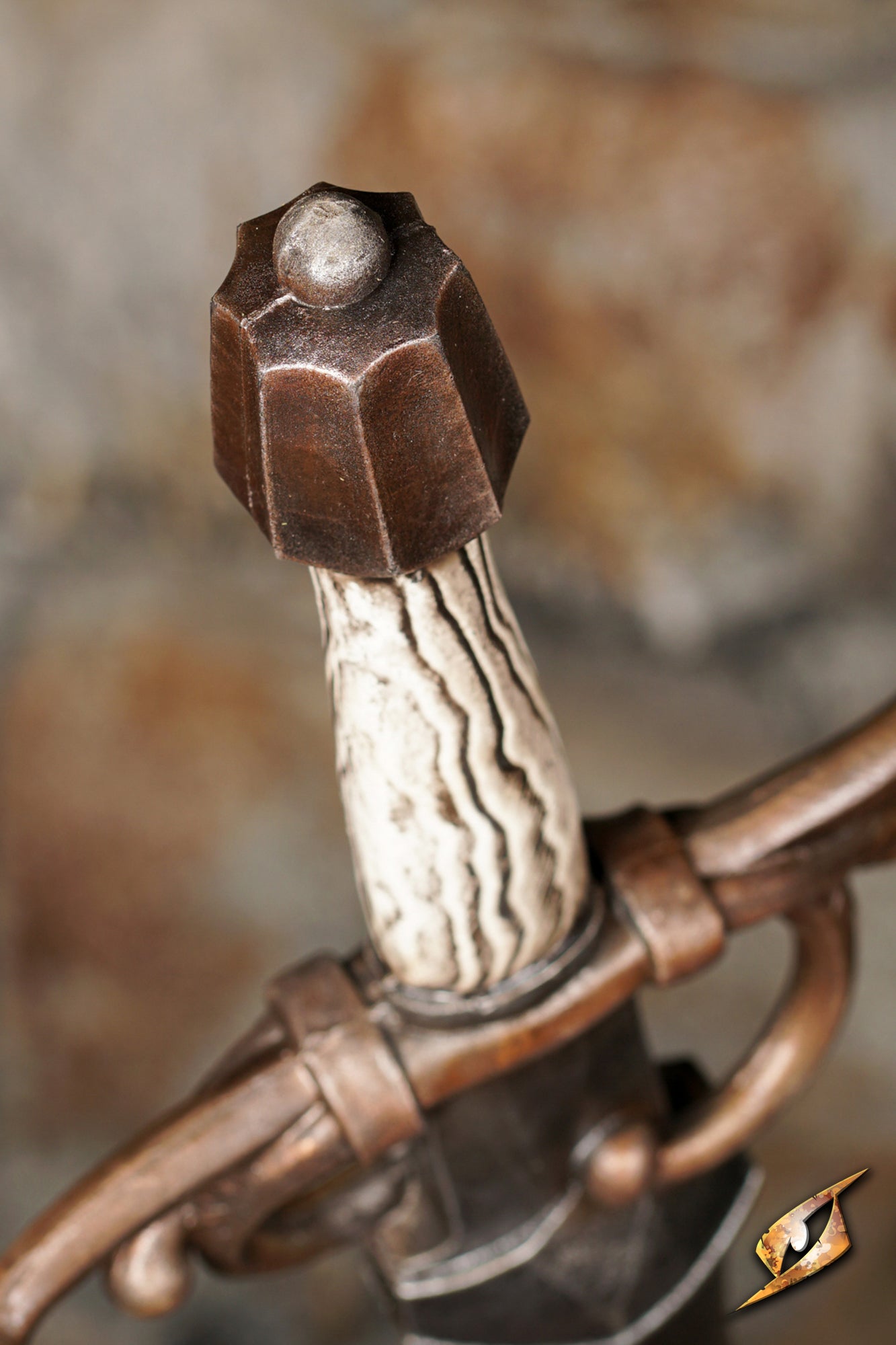 Close-up of the hilt of the Noble Flamberge showcasing intricate design and craftsmanship.