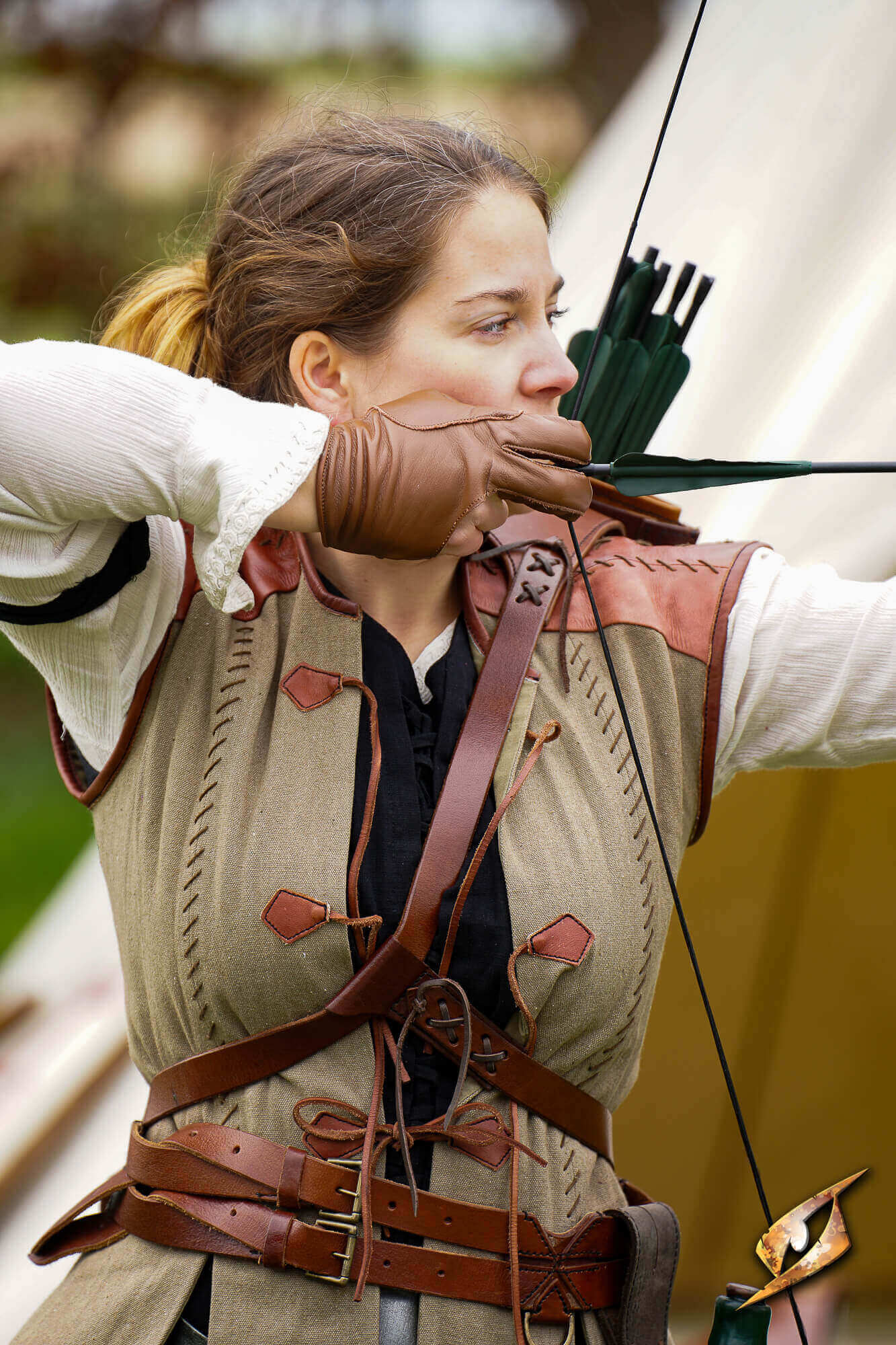 Archery Half-glove worn by an archer aiming with a bow, showcasing dexterity and comfort in action.