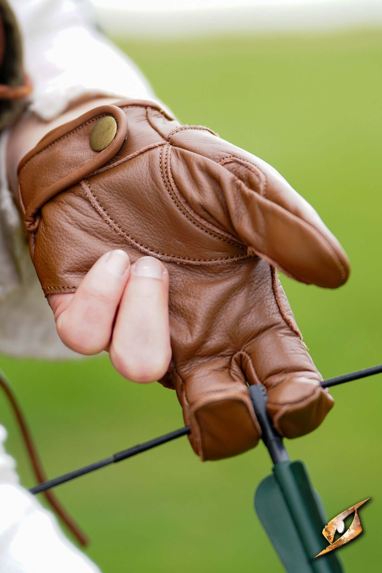 Archery Half-glove worn by an archer, showcasing premium leather for protection and dexterity.