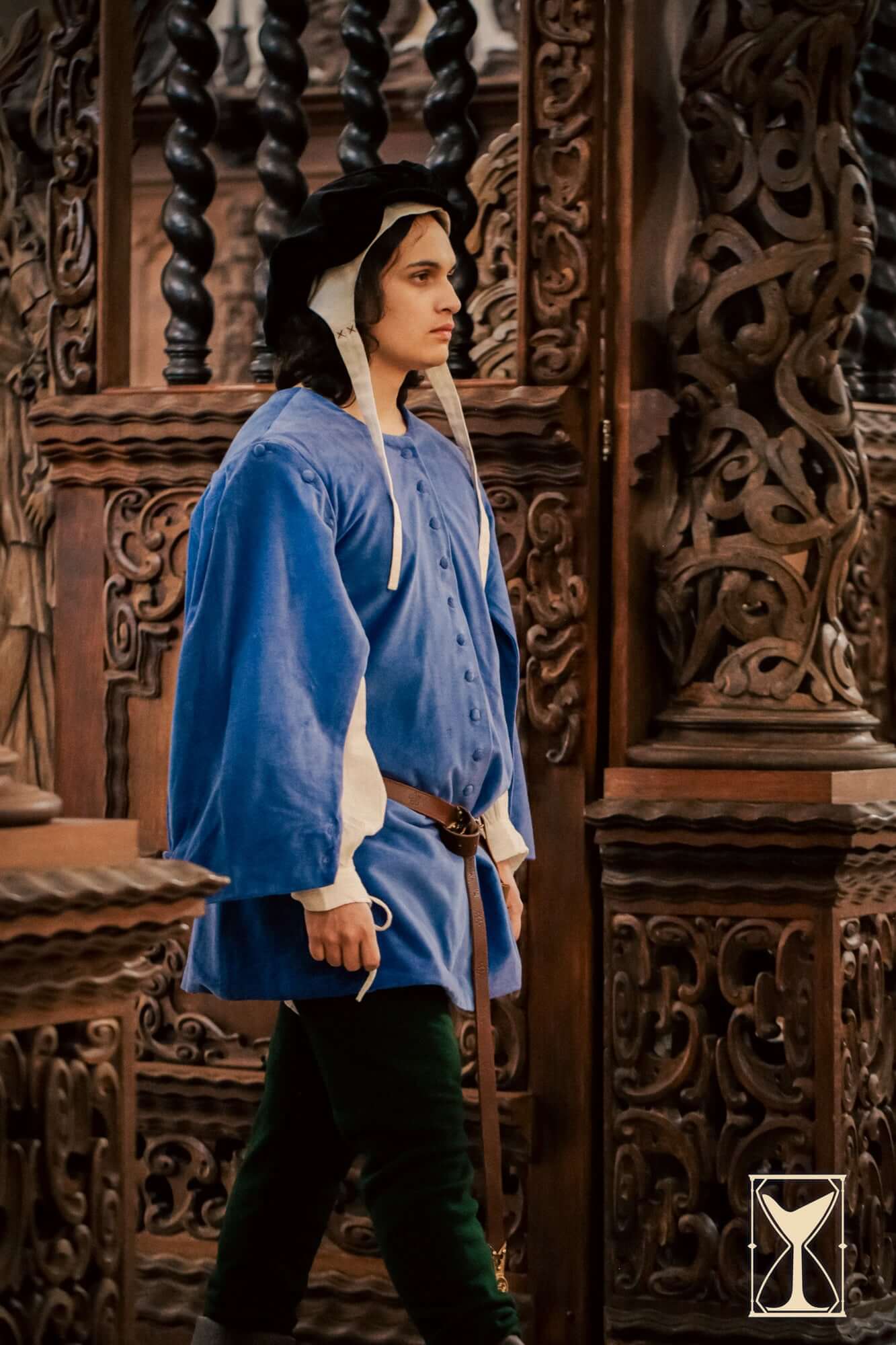 Velvet Surcoat worn by a model, showcasing medieval-inspired design and rich fabric details.