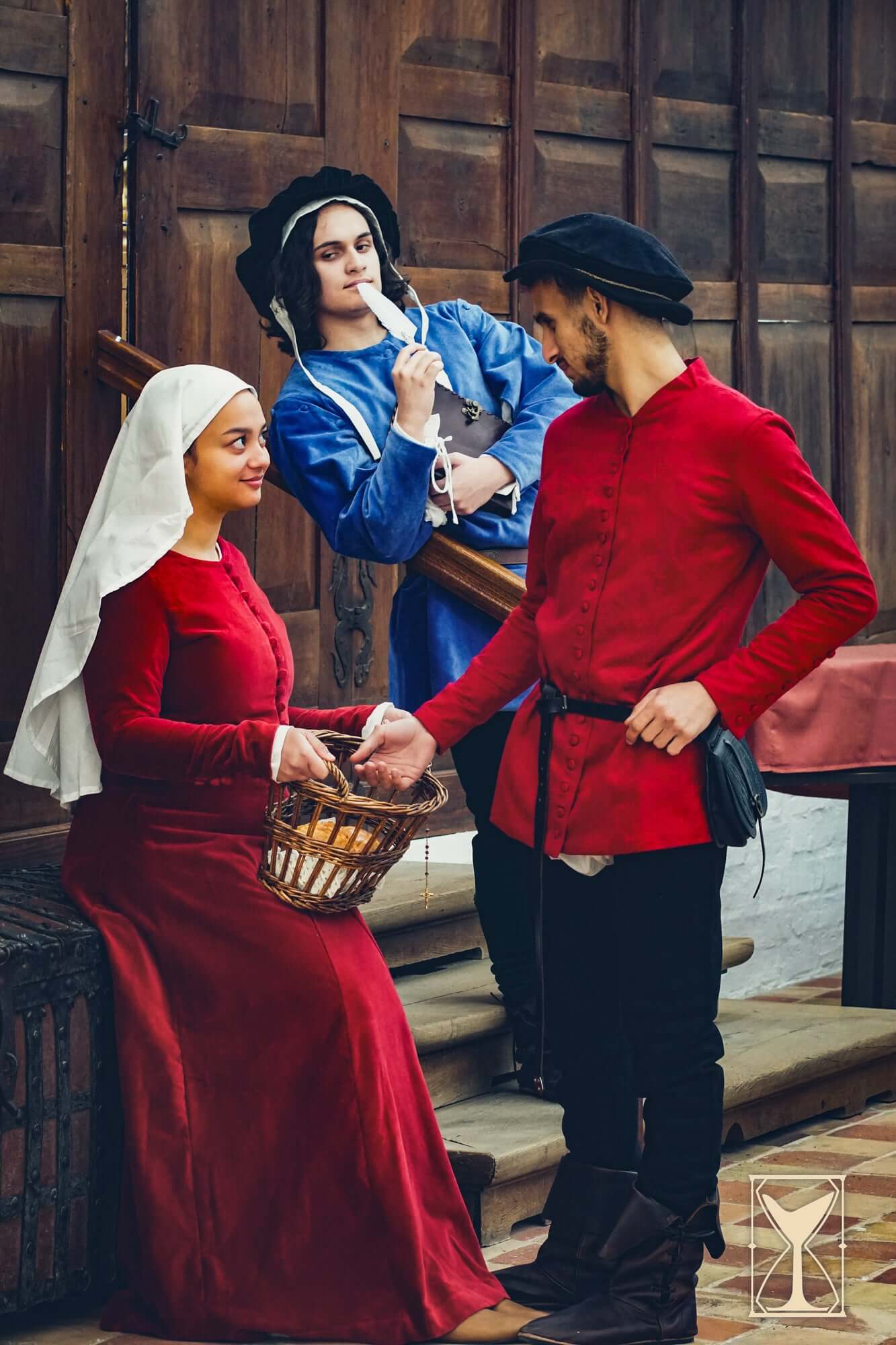 Flat Hat Edward worn by actors in Renaissance costumes with historical clothing and accessories.