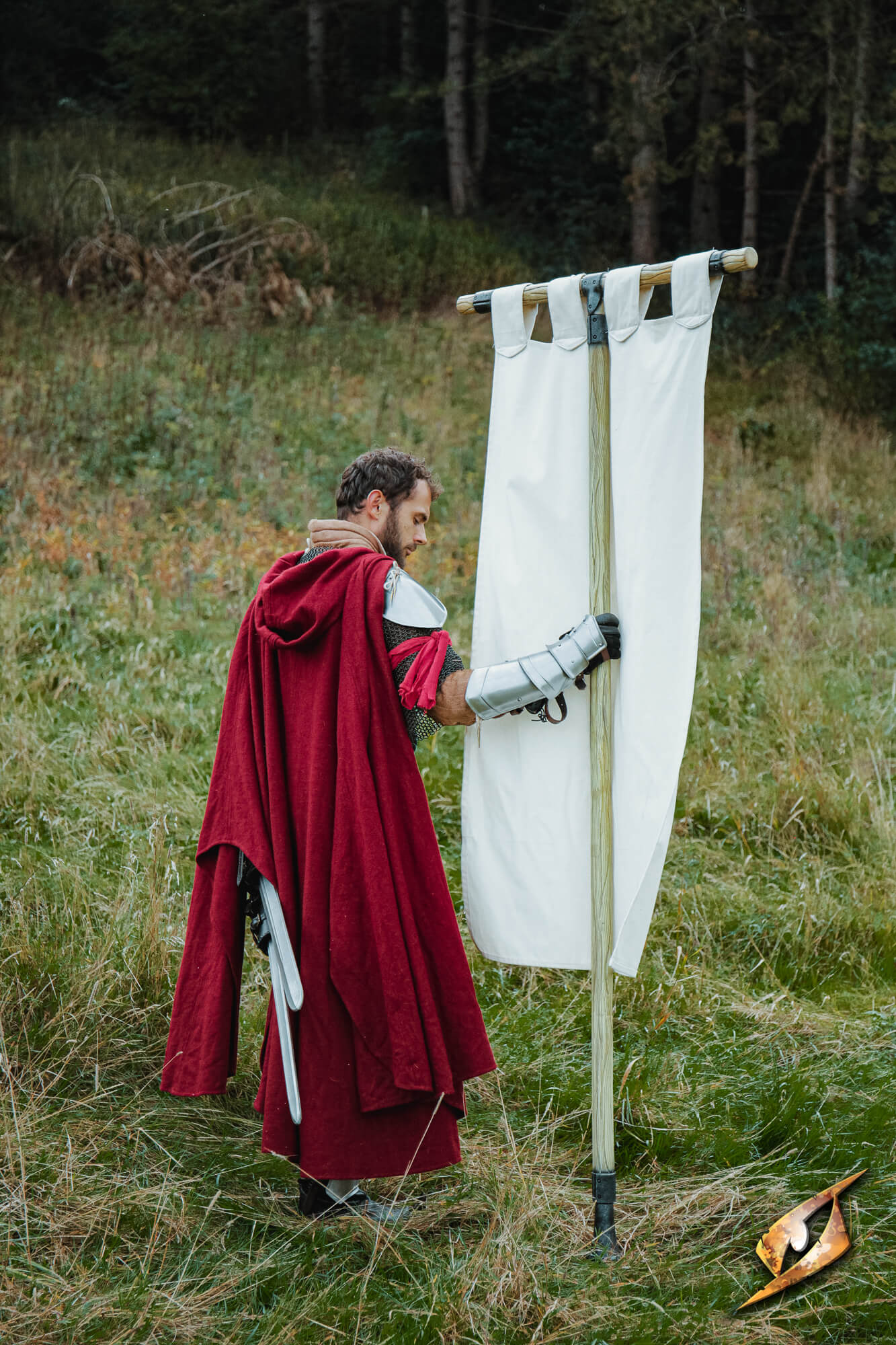 Complete Battle Standard Set - T-Top used in LARP by a character in a red cloak with a white banner in a natural setting.