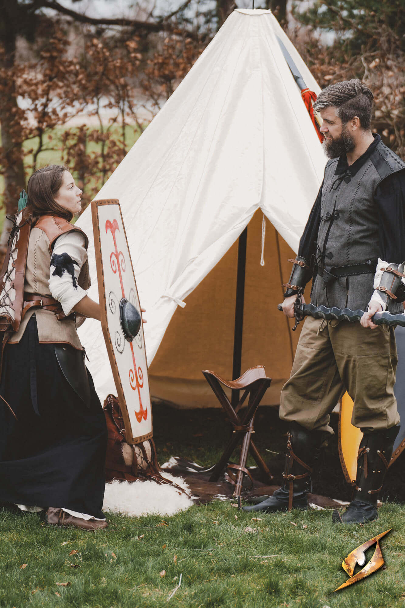 Complete Conical Tent - Compact set up for a medieval reenactment with characters in armor and costumes.