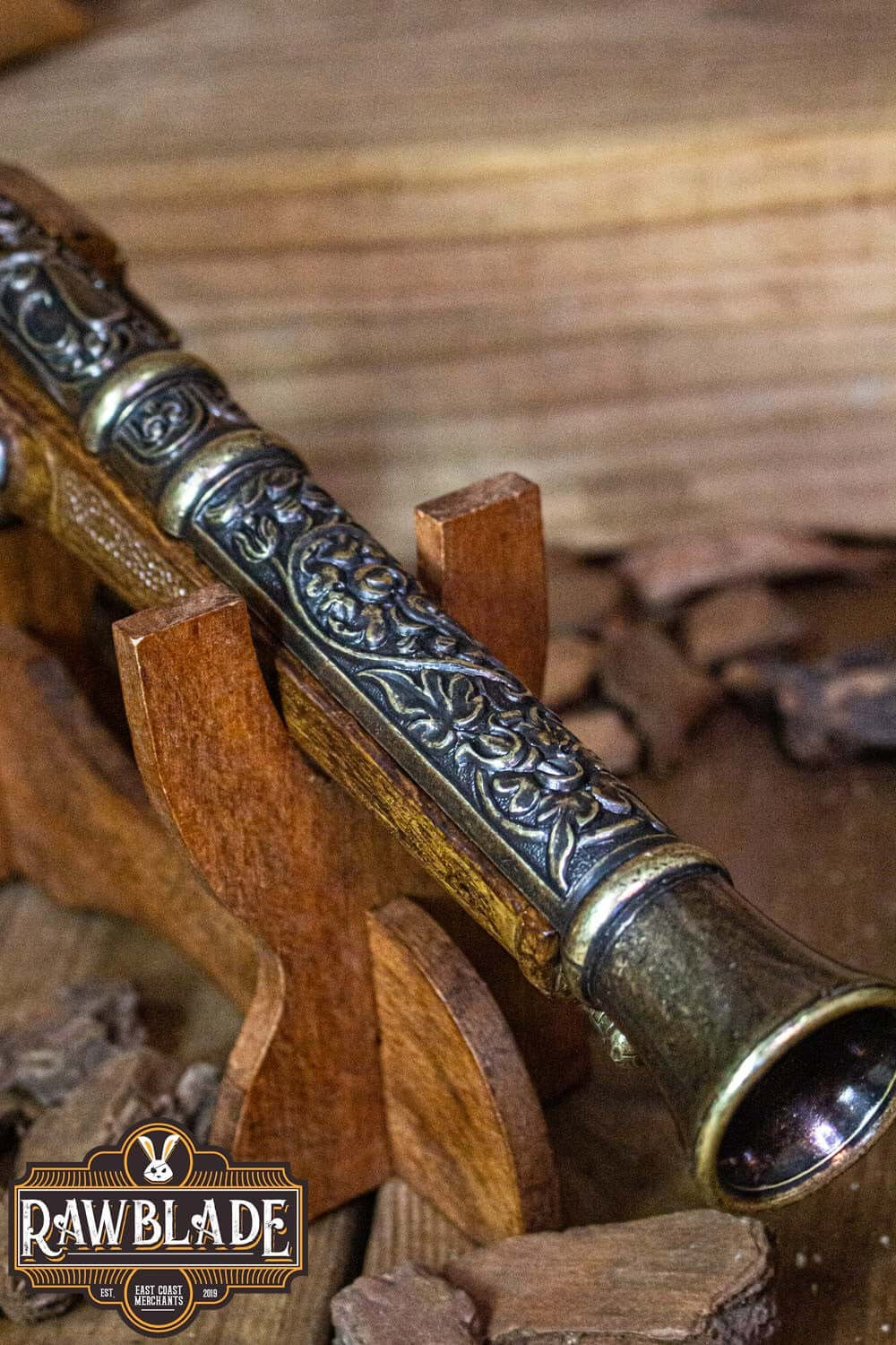 Thunder Gun displayed on a wooden stand, showcasing intricate designs and a wide muzzle for powerful blasts.