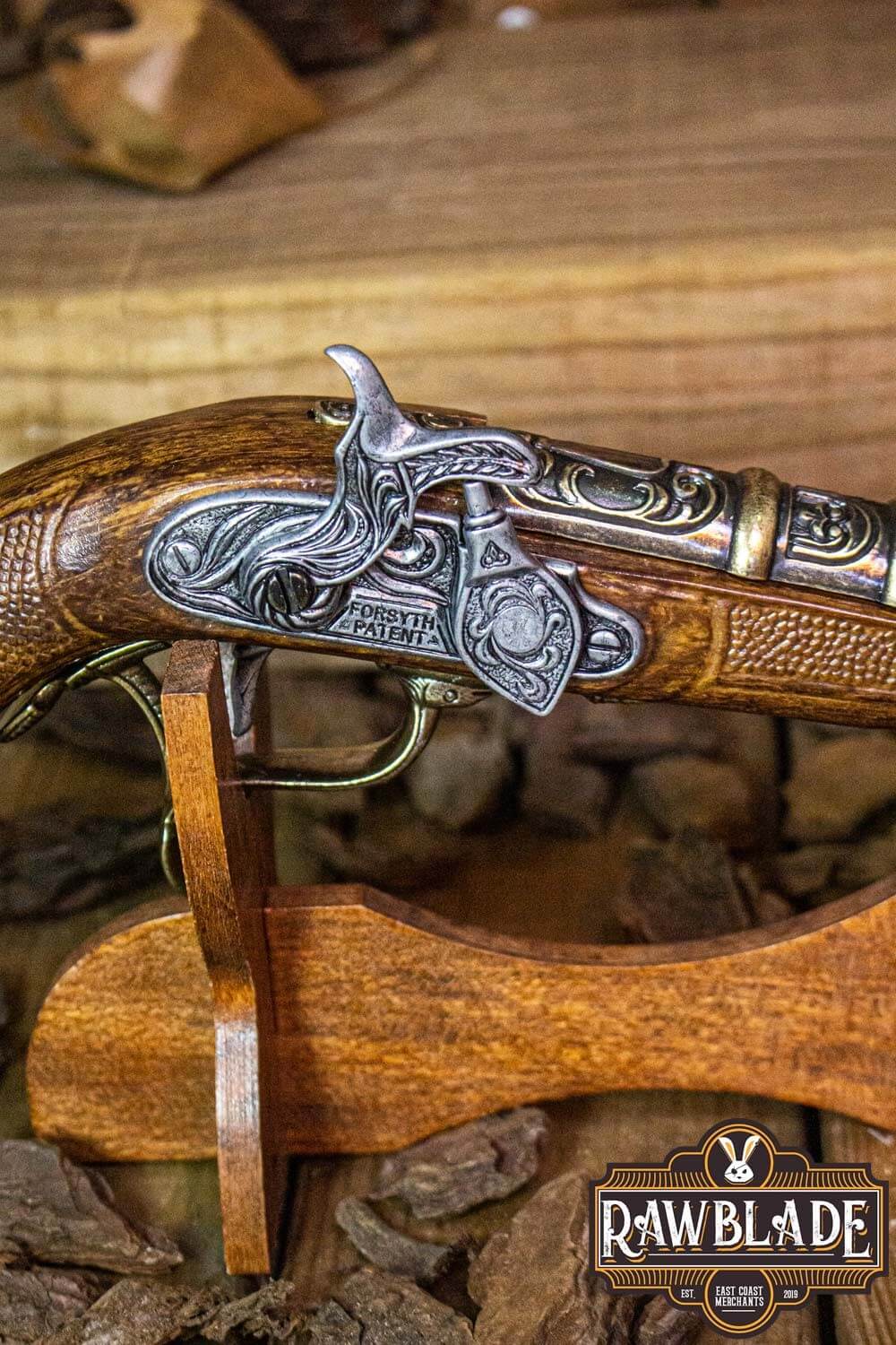 Close-up of the Thunder Gun's ornate trigger mechanism showcasing its craftsmanship and design.