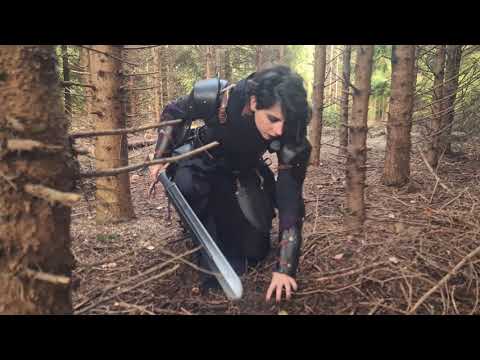 Renegade Vambraces worn by a character in a forest setting, enhancing arm protection and mobility while on a quest.